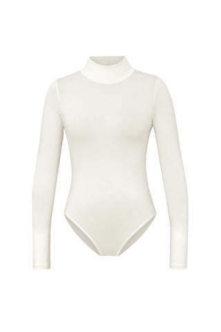 The Giselle Bodysuit - Pearl is a white long-sleeve with a high-neck design. The fabric is smooth and offers a seamless fit, providing a snug feel. Its minimalistic design exudes a clean and simple look, free of visible patterns or adornments.