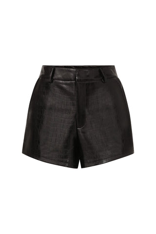 The Jaclyn Short - Black is a pair of high-waisted, faux leather shorts featuring a faux crocodile texture. Perfect for Fall, these shorts have a fitted silhouette, belt loops, and a front zipper closure designed to elongate your legs.