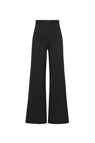 The Ava Pant - Black is displayed against a white background, showcasing its high-waist, wide-leg design. These pants feature a sculpted waist and a seamless front with clean lines, creating a minimalist look suitable for various occasions.