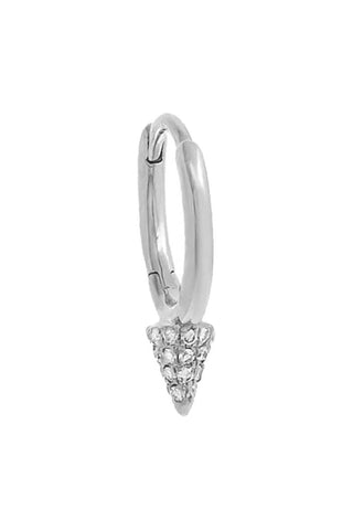 The Diamond Point Huggie Earring 14K by Adina Eden is a small, silver earring adorned with a pointed, conical charm encrusted with pavé diamonds. Its classic and clean design makes it suitable for various styles and occasions. The earring is displayed against a white background.