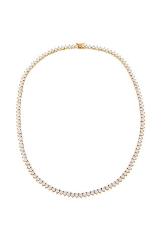 The Three Prong Tennis Necklace by By Adina Eden features a delicate design with symmetrical white CZ gemstones set in a continuous line around its entire length, creating a radiant circular shape. The small gold-toned clasp is seamlessly integrated into the design, giving the necklace an elegant and simple appearance.