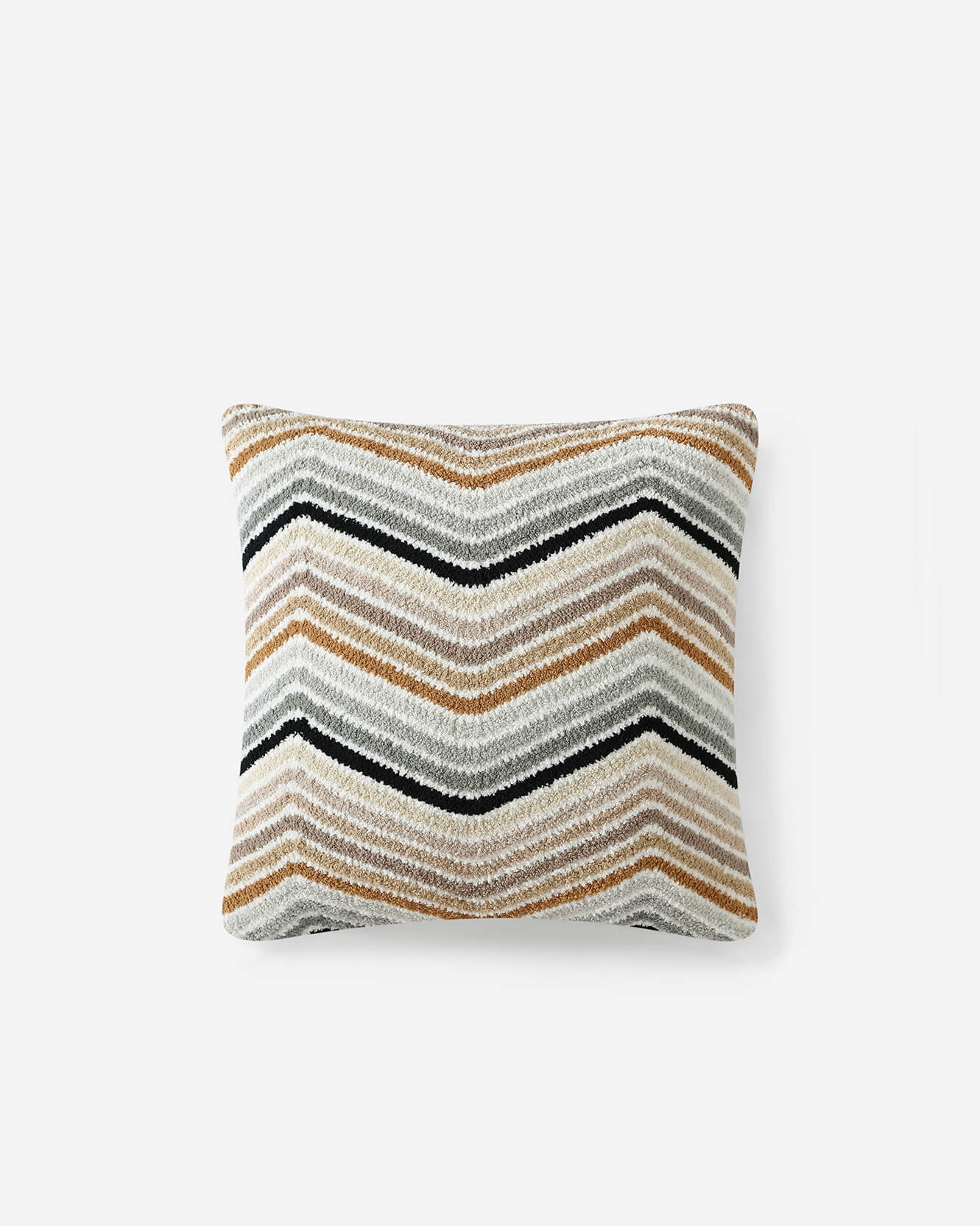 A rectangular Cusco Throw Pillow by Sunday Citizen featuring a zigzag pattern in shades of beige, brown, black, and white. The memory foam filling provides exceptional comfort while the machine washable cover makes it easy to clean. The pillow is positioned against a plain white background.