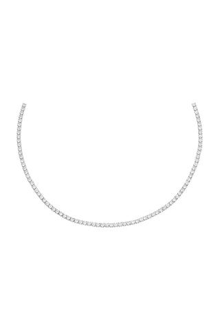 The Thin Tennis Choker by By Adina Eden is a delicate piece adorned with small, evenly spaced dazzling CZ stones. The simplicity and elegance of the design accentuate the series of sparkling stones that encompass the entire length of the gold plated sterling silver necklace. The plain white background highlights its features beautifully.