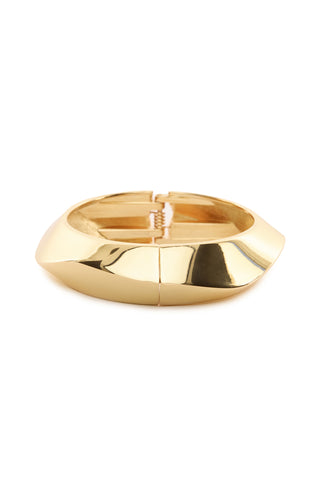 The Valentina Textured Bangle - Gold gleams with its polished finish, modern rounded design, and hinge closure, making it a stunning statement accessory against a white background.