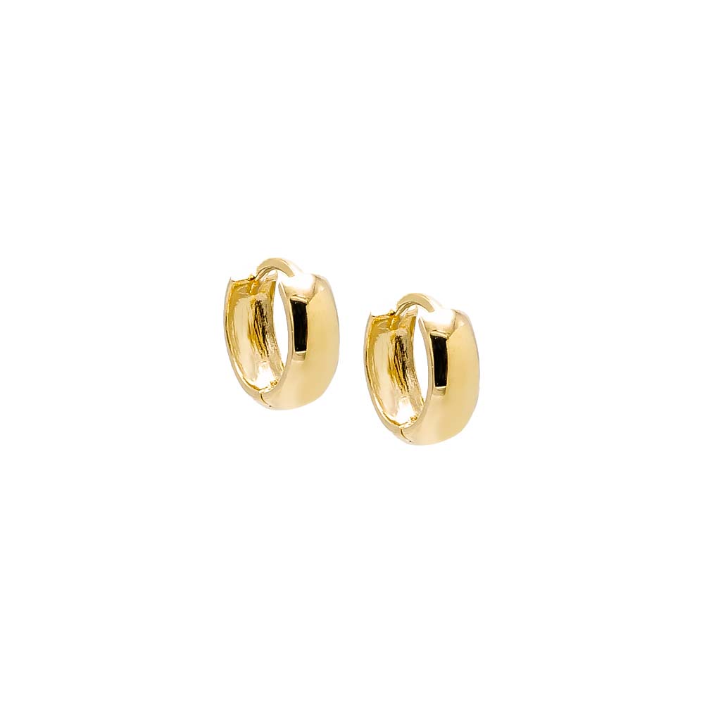 Wide Solid Cartilage Huggie Earrings 14K by Adina Eden, displayed on a white background. These small gold hoop earrings feature a polished finish and showcase a simple, classic minimalist design with smooth, rounded edges.
